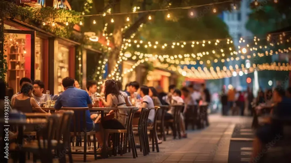 Bokeh background of Street Bar beer restaurant, outdoor in asia, People sit chill out and hang out dinner and listen to music together in Avenue, Happy life ,work hard play hard. Generative Ai